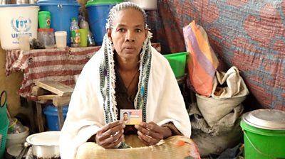 Mulu Taddesse with a picture of her dead son