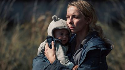 Image featuring Jodie Comer holding a baby in The End We Start From.