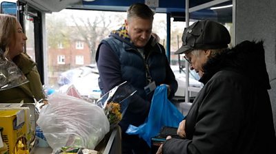 On board the double-decker food bank bus