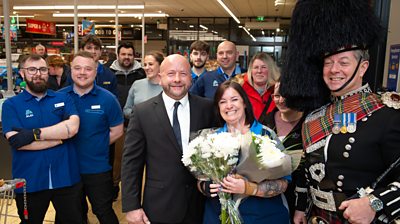 Lynne Fuller was working on Aldi's check-out when her boyfriend surprised her with a proposal.