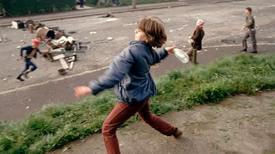 Ann Marie, aged 10, throwing bottles at British troops during a riot in Belfast in 1981.