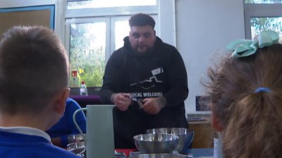 A London chef has given a special cooking class to a primary school close to where he grew up in Tottenham to raise awareness and help children learn to cook during tough times.