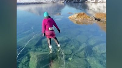 Skating on an "ice window" in Alaska