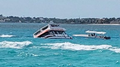 US tourist dies after boat capsizes in the Bahamas - BBC News