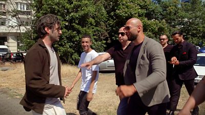 Andrew and Tristan Tate being questioned on the street by reporter Matt Shea in Bucharest