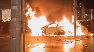 Car burning on the street