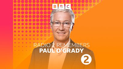 Artwork for Radio 2 Remembers Paul O’Grady, featuring a photo of Paul O’Grady against an orange and red background. 