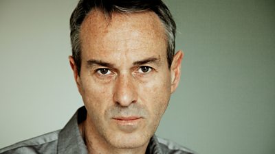 Image of Ivo van Hove looking to camera. 