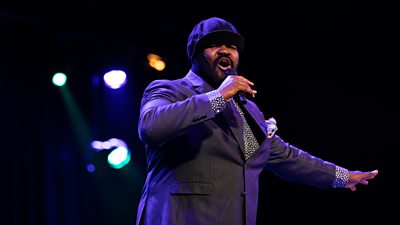 Gregory Porter performing on stage