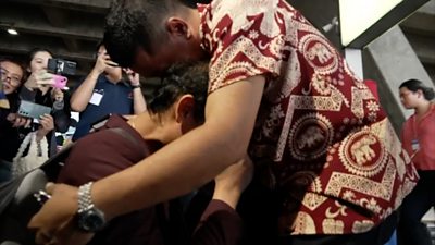 Thai hostage hugs father