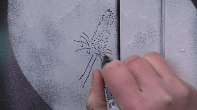 Hand drawing on an electrical box