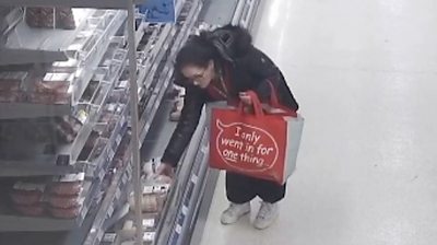 CCTV captures the woman taking meat from a supermarket and filling a trolley with jeans and coats.