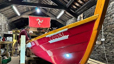 The Skiff in the workshed