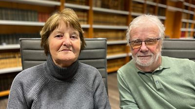 Picture of Pauline Murrell and Roger Parrish in a room at the courthouse in Paris