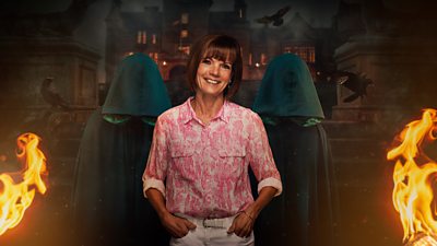 Diane stands in front of two cloaked figures outside the castle at night. Flames burn on either side of them and black crows fly in the background.