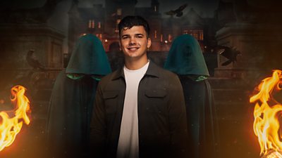 Harry stands in front of two cloaked figures outside the castle at night. Flames burn on either side of them and black crows fly in the background.