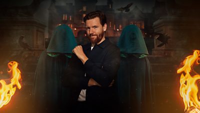 Paul stands in front of two cloaked figures outside the castle at night. Flames burn on either side of them and black crows fly in the background.