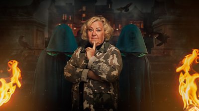 Sonja stands in front of two cloaked figures outside the castle at night. Flames burn on either side of them and black crows fly in the background.