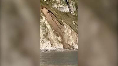 Lulworth Cove landslide captured after heaving flooding