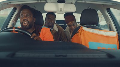 Kwabena (Adjani Salmon), Maurice (Demmy Laipo) and Funmi (Rachel Adedeji) sat in a car in a scene from Dreaming Whilst Black. 