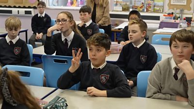 Children being taught sign language at Dane Ghyll Community Primary School
