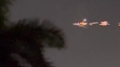 Footage of plane spluttering flames