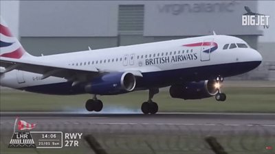 A plane attempts a bumpy landing at Heathrow Airport