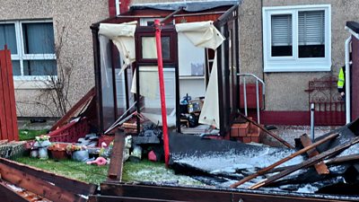 A conservatory torn apart by Storm Isha winds