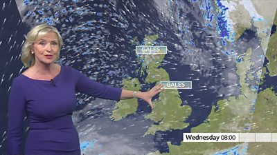 Carol Kirkwood presenting the weather, gale signs are on the map