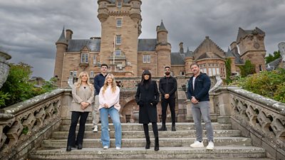 Left to right: The Traitors Final Five contestants stand outside the castle with Claudia. Left to right: Evie, Harry, Mollie, Claudia, Jaz and Andrew