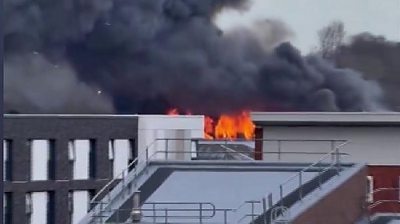 Fire burning in Liverpool city centre, with huge plume of smoke