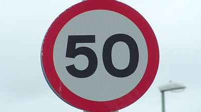 A sign reading 50mph
