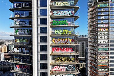 Graffiti spray painted unfinished skyscraper in Los Angeles