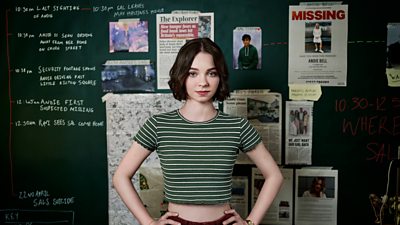 Emma Myers as Pip, standing in front of a blackboard of evidence gathered