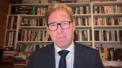 Tobias Ellwood in an office