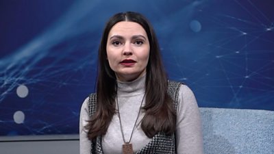 Marharyta Halich, TV Presenter, sitting in TV studio in Suspilne (Public) Zaporizhzhia