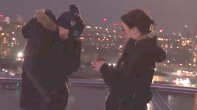 Sarah proposes to her boyfriend Daniel on top of the O2