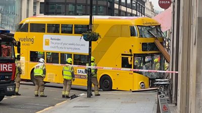 Bus removed from building front