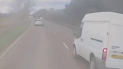 White van on the wrong side of the road after a dangerous overtaking manoeuvre on the A10 in Cambridgeshire.