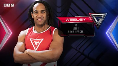 Wesley smiles to camera next to a red graphic reading: “Wesley, 35 - Leeds, Admin Officer” 