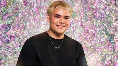 Contestant Rossi with a green and pink diamond effect background