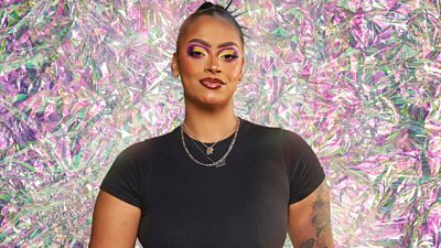 Contestant Shania with a green and pink diamond effect background