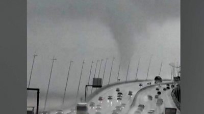 Video shows the waterspout on the Tagus Estuary on Thursday, in southern Lisbon.