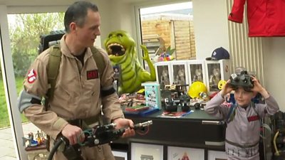 Simon Gray and one of his children in Ghostbusters outfits