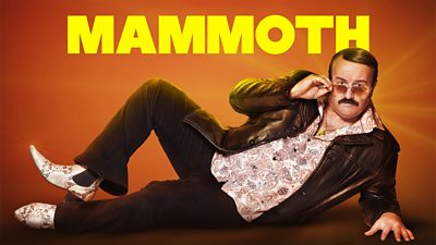 Key Art for Mammoth - Tony Mammoth (Mike Bubbins) lies on his side and lowers his sunglasses to look at the camera. “Mammoth” is written in block capitals at the top of the image.