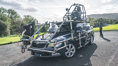 A Skoda estate car with a large filming rig - not only is a camera and lighting rig able to film actors inside the car, but the car can be driven by a driver from the roof