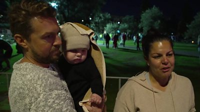 A family in Sydney attending a vigil for the Sydney stabbing victims.