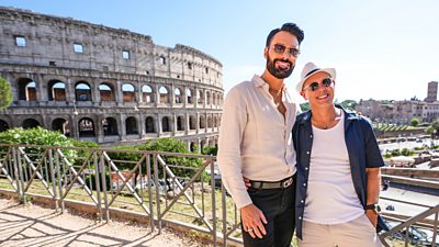 Rob and Rylan pose for a picture in front of the Colosseum in Rome