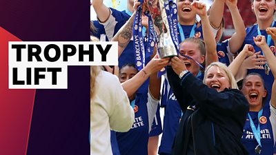 Chelsea manager Emma Hayes lifts the WSL trophy in her final game in charge