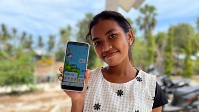 Young girl in Indonesia using the Oky app 